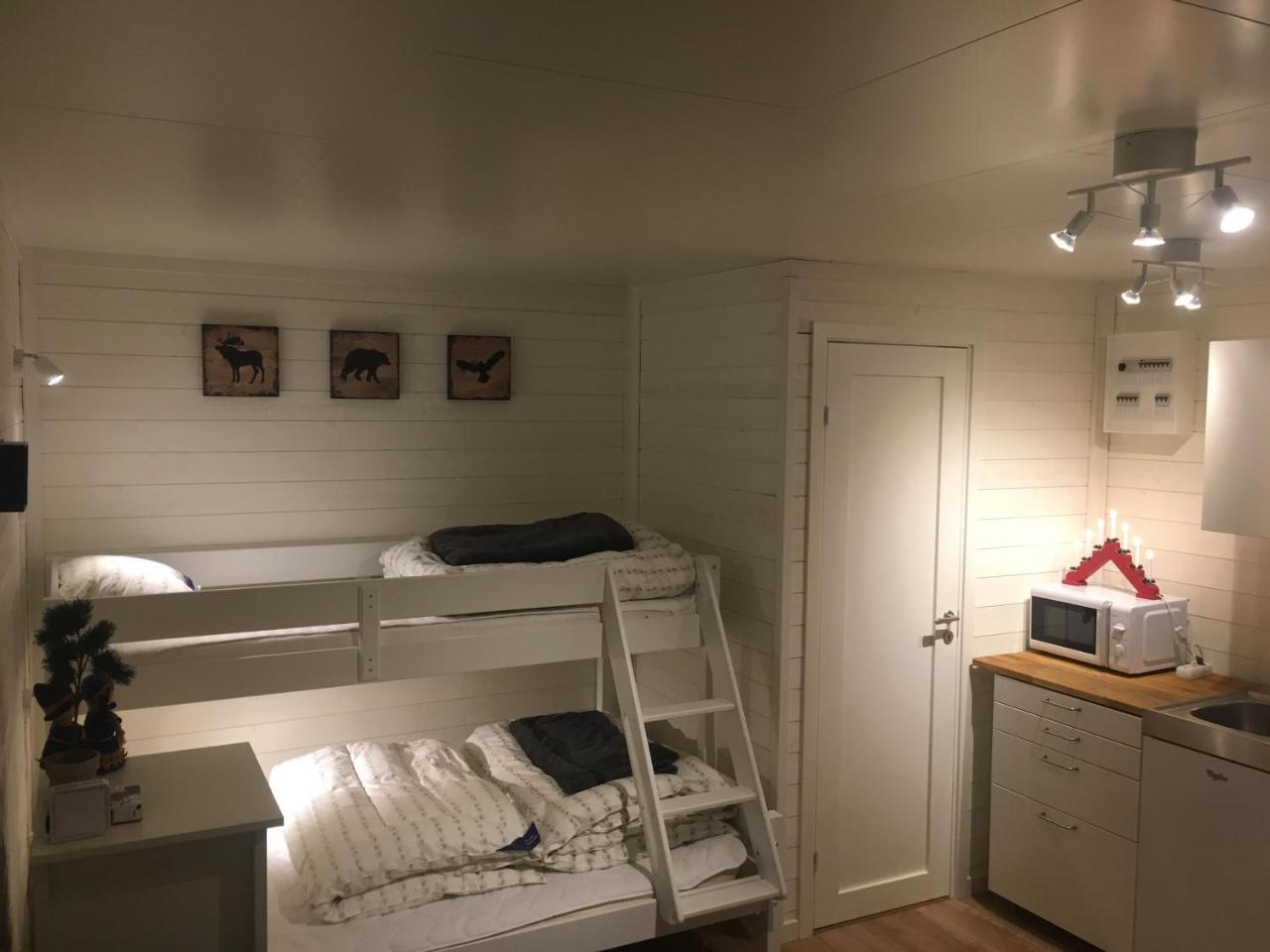 Camp Caroli Wooden Cabins Jukkasjärvi Exterior foto